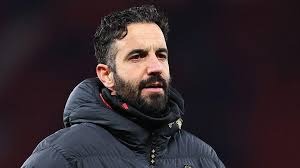 Ruben Amorim poses after being unveiled as AC Milan's new head coach. The former Manchester United manager has signed a three-year contract with the Italian club as they aim to return to Champions League football and compete for major honours.