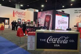 Crowd of football fans, media personnel, and influencers attending Coca-Cola’s “Feel It All” FIFA World Cup 2026 campaign launch event at Ghud Park, Accra Mall, Ghana.