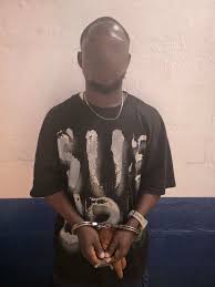 Michael Mensah, the suspect arrested by Ghana Police in connection with the death of UCC student Avinu Innocentia.
